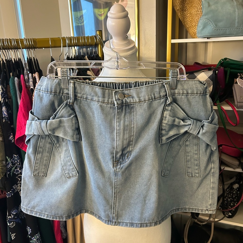 Light Blue Denim Mini Skirt with Bow Accents